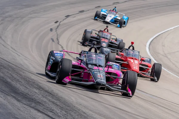 stock image HELIO CASTRONEVES (06) of Sao Paulo, Brazil races through the turns during the PPG 375 at the Texas Motor Speedway in Ft Worth TX.