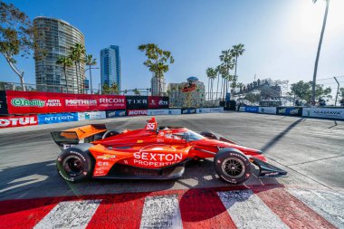 Kopenhag 'lı BENJAMIN PEDERSEN (R) (55) (Kopenhag, Danimarka) Long Beach' teki Long Beach Caddelerinde yapılan Acura Grand Prix antrenmanı sırasında 11. virajdan geçer..