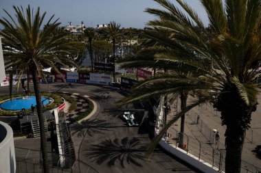 Payette, Idaho 'dan STING RAY ROBB (R) (51), Long Beach, CA, ABD' deki Acura Grand Prix antrenmanı sırasında yolda ilerliyor..