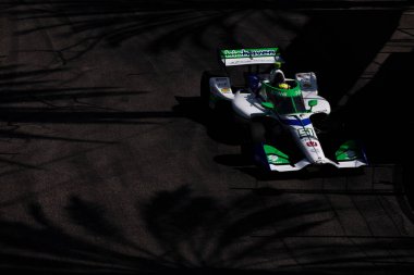 Payette, Idaho 'dan STING RAY ROBB (R) (51), Long Beach, CA, ABD' deki Acura Grand Prix antrenmanı sırasında yolda ilerliyor..