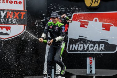 INDYCAR NXT sürücüsü, MATTEO NANNININI (75) (R) (İtalya), Indianapolis, IN, ABD 'deki Indianapolis Motor Yarışı' nda ilk INDYCAR NXT yarışını kazandı..