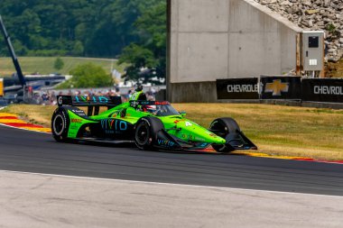 Hedensted, Danimarka 'dan Christian LUNGAARD (45), Elkhart Lake WI. Dünya Savaşı' ndaki Road America 'da yapılan Sonsio Grand Prix tatbikatı sırasında virajlardan geçer..