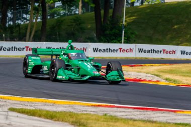 MARCUS ARMSTRONG (R) (11) of Christchurch, New Zealand travels through the turns during a practice for the Sonsio Grand Prix at Road America in Elkhart Lake WI. clipart