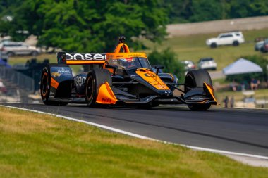FELIX ROSENQVIST (6), İsveç Elkhart Gölü 1. Dünya Savaşı 'ndaki Road America' da yapılan Sonsio Grand Prix tatbikatı sırasında virajlardan geçer..