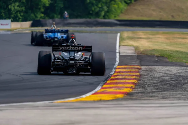 stock image WILL POWER (12) of Toowoomba, Australia travels through the turns during a practice for the Sonsio Grand Prix at Road America in Elkhart Lake WI.