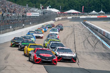 NASCAR Cup Driver Christopher Bell (20) races for position for the Crayon 301 at the New Hampshire Motor Speedway in Loudon NH.
