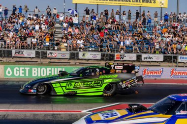 NHRA driver, Matt Hagan, prepares to qualify for the Dodge Power Brokers NHRA Mile-High Nationals in Morrison, CO, USA.  
