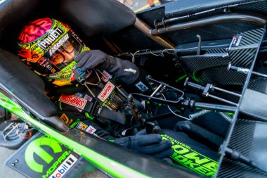 NHRA driver, Leah Pruett, prepares to qualify for the Dodge Power Brokers NHRA Mile-High Nationals in Morrison, CO, USA.  