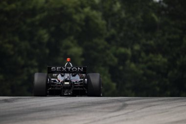 SANTINO FERRUCCI (14), Connecticut, Woodbury 'li Honda Indy 200' ün Lexington OH 'daki Orta Ohio Spor Araba Kursu' ndaki antrenmanı sırasında yolda ilerliyor..