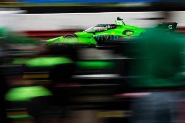 Hedensted, Danimarka 'dan Christian LUNGAARD (45) Lexington OH' daki Orta Ohio Spor Otomobil Kursu 'nda Honda Indy 200 elemeleri sırasında yolda ilerliyor..