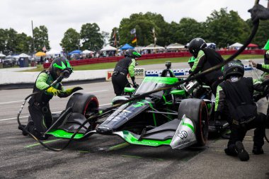Juncos-Hollinger Yarış ekibi, Honda Indy 200 'de Lexington OH' daki Ohio 'nun ortasındaki spor araba sahasında mola veriyor..