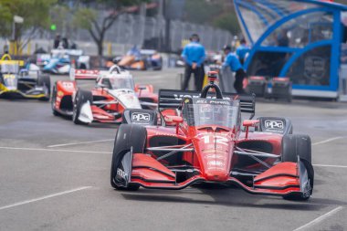 Toowoomba, Avustralya 'dan INDYCAR Serisi sürücüsü Will PowER (12), Nashville TN' deki Nashville Caddelerinde düzenlenen Big Machine Music City Grand Prix tatbikatı sırasında dönüşler boyunca seyahat eder..