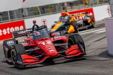 Toowoomba, Avustralya 'dan INDYCAR Driver, Will POWER (12), Nashville TN' deki Nashville Caddelerinde düzenlenen Big Machine Music City Grand Prix sırasında virajlarda yarışır..