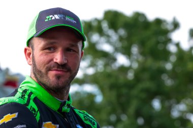 INDYCAR Serisi sürücüsü, Arrecifes, Arjantin 'den AGUSTIN HUGO CANAPINO (R) (78), Nashville, Nashville sokaklarında düzenlenen Big Machine Music City Grand Prix' ine hazırlanıyor..