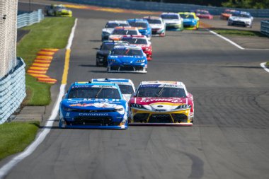 NASCAR Xfinity Driver, Daniel Hemriç (11) Watkins Glen NY 'deki Watkins Flen International' da Shriners Çocuk 200 için yarışıyor..