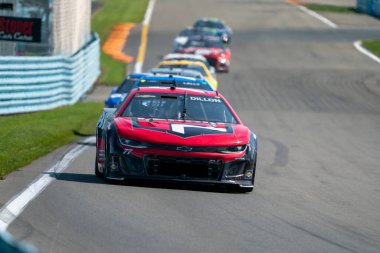 NASCAR Cup Driver, Ty Dillon (77) Watkins Glen NY 'deki Glen International' da Go Bowling için yarışır..