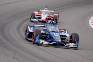 INDYCAR Serisi sürücüsü, Barcelona, İspanya 'dan ALEX PALOU (10), Madison IL' deki World Wide Technology Raceway 'de Bommarito Otomotiv Grubu 500 sırasında dönüşlerde yarışır..