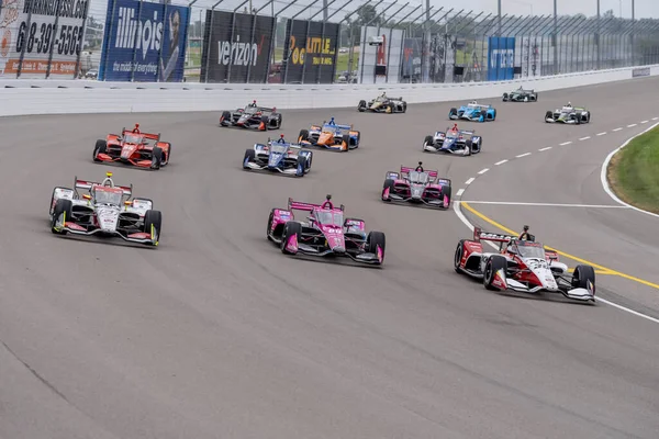 stock image INDYCAR Series driver, STING RAY ROBB (R) (51) of Payette, Idaho, races through the turns during the Bommarito Automotive Group 500 at World Wide Technology Raceway in Madison IL.