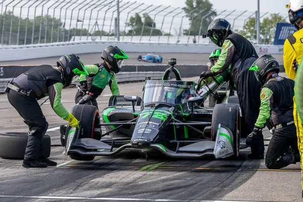 stock image INDYCAR Series driver, AGUSTIN HUGO CANAPINO (R) (78) of Arrecifes, Argentina, brings his car in for service during the Bommarito Automotive Group 500 at World Wide Technology Raceway in Madison IL.