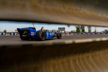 Ft. Lauderdale, Florida 'dan INDYCAR Serisi sürücüsü RYAN HUNTER-REAY (20) Portland veya Portland' daki Portland International Raceway 'de düzenlenen Bitnile.com Grand Prix tatbikatı sırasında dönüşler boyunca seyahat eder..