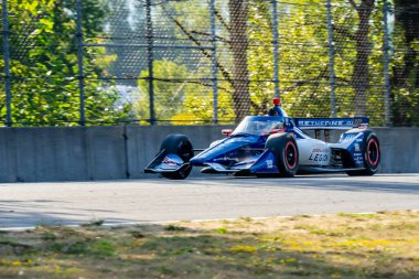 INDYCAR Serisi pilotu, Barcelona, İspanya 'dan ALEX PALOU (10) Portland' daki Portland Uluslararası Yarış Pisti 'nde düzenlenen Bitnile.com Grand Prix' inin son antrenman oturumunda geriye doğru seyahat eder..