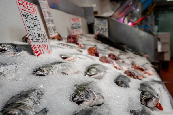 The mornings fresh catch is on ice, ready to be purchased by consumers in an open market