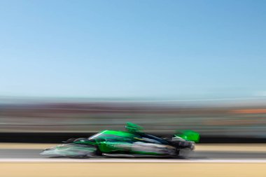 INDYCAR Serisi sürücüsü, Cambridge, Cambridgeshire, İngiltere 'den CALLUM ILOTT (77), Monterey' deki WeatherTech Raceway Laguna Seca 'da Monterey' in Firestone Grand Prix tatbikatı sırasında dönüşlerde seyahat eder..