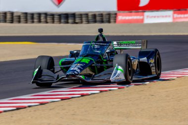 INDYCAR Serisi sürücüsü, AGUSTIN HUGO CANAPINO (R) (78) Arrecifes, Arjantin, Monterey 'deki WeatherTech Raceway Laguna Seca' da düzenlenen Firestone Grand Prix tatbikatı sırasında dönüşler boyunca seyahat eder..
