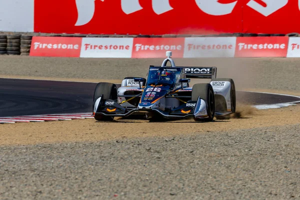 Valencia, Kaliforniya 'dan INDYCAR Serisi sürücüsü, COLTON HERTA (26), Monterey' deki WeatherTech Raceway Laguna Seca 'da düzenlenen Firestone Grand Prix tatbikatı sırasında virajlardan geçer..