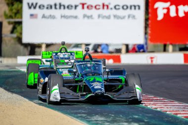INDYCAR Serisi sürücüsü, AGUSTIN HUGO CANAPINO (R) (78) Arrecifes, Arjantin, Monterey 'deki WeatherTech Raceway Laguna Seca' da düzenlenen Firestone Grand Prix tatbikatı sırasında dönüşler boyunca seyahat eder..