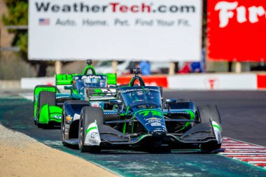 INDYCAR Serisi sürücüsü, AGUSTIN HUGO CANAPINO (R) (78) Arrecifes, Arjantin, Monterey 'deki WeatherTech Raceway Laguna Seca' da düzenlenen Firestone Grand Prix tatbikatı sırasında dönüşler boyunca seyahat eder..