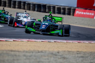 Firestone Serisi sürücüsü, Sao Paulo, Brezilya 'dan VICTOR FRANZONNI (75) tarafından INDYCAR NXT, Monterey Firestone Grand Prix' inde Monterey 'deki WeatherTech Raceway Laguna Seca' da yarışır..