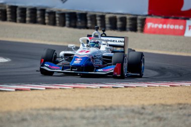 Firestone Serisi sürücüsü KYFFIN SIMPSON (21) Grand Caymen, Caymen Adaları 'ndan INDYCAR NXT, Monterey Firestone Grand Prix sırasında Monterey WeatherTech Raceway Laguna Seca' da yarışır..