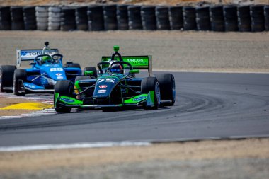 Firestone Serisi sürücüsü, Sao Paulo, Brezilya 'dan VICTOR FRANZONNI (75) tarafından INDYCAR NXT, Monterey Firestone Grand Prix' inde Monterey 'deki WeatherTech Raceway Laguna Seca' da yarışır..