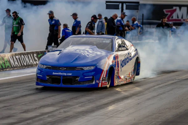 stock image Sep 22, 2023-Concord, NC:  NHRA Pro Stock Series driver, Greg Anderson, runs down the lane during a qualifying session for the Betway Carolina Nationals.