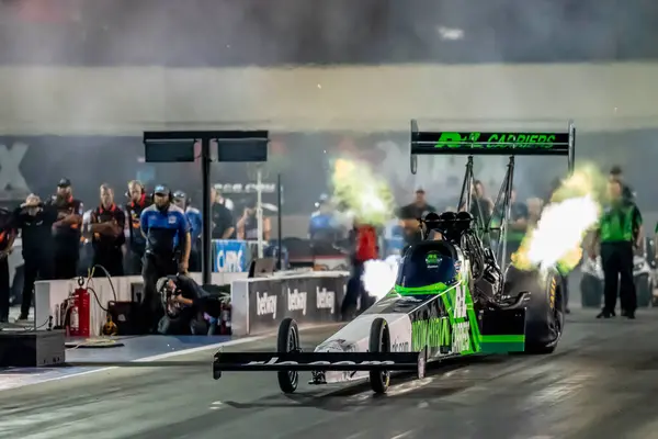 stock image Sep 22, 2023-Concord, NC:  NHRA Top Fuel Dragster Series driver, Josh Hart, runs down the lane during a qualifying session for the Betway Carolina Nationals.