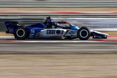 New Albany, Ohio 'dan GRAHAM RAHAL (15), Termal Kulüpteki Termal Kulüpte 1 Milyon Dolarlık Açılış Yarışması' nın antrenman oturumunda virajlardan geçiyor..