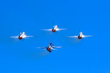 March 01, 2024-El Centro, CA:  Thunderbirds refine aerial maneuvers in spring training, showcasing Air Force excellence worldwide in precision and skillful formations. clipart