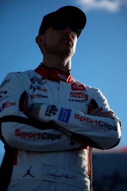 NASCAR Cup Series driver, Denny Hamlin gets ready to practice for the Cook Out 400 in Martinsville, VA, USA clipart