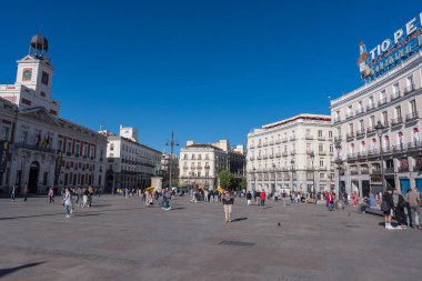 Madrid's Puerta del Sol: Vibrant Square, Historic Landmark, New Year's Tradition Hub clipart