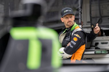 ROMAIN GROSJEAN (77) of Geneva, Switzerland prepares for the 108th Running of the Indianapolis 500 at the Indianapolis Motor Speedway in Speedway, IN. clipart