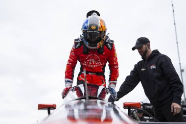 SANTINO FERRUCCI (14) of Woodbury, Connecticut climbs into their car during the Indy 500 Open Test at the Indianapolis Motor Speedway in Speedway IN. clipart