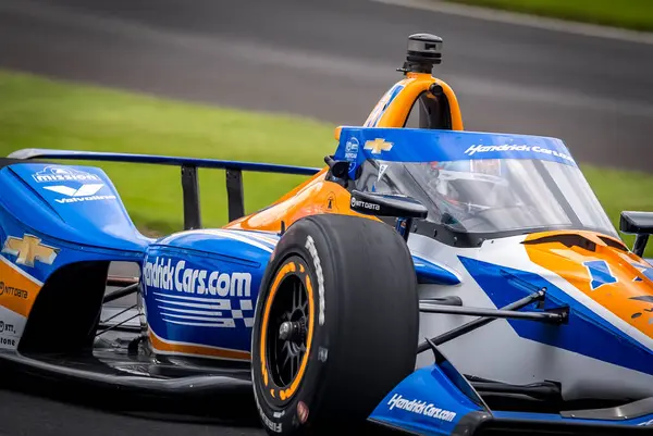 stock image KYLE LARSON (17) of Elk Grove, California comes off turn 3 during a practice for the 108th Running of the Indianapolis 500 at the Indianapolis Motor Speedway in Speedway, IN.