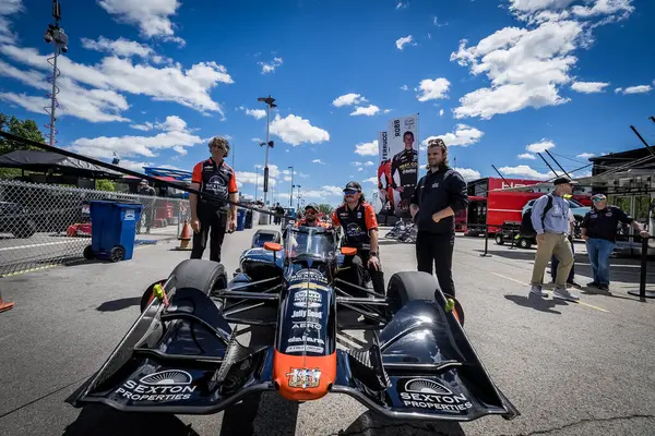 stock image The crew of AJ Foyt Racing Chevrolet prepare their race cars for the XPEL Grand Prix at Road America in Elkhart Lake WI.