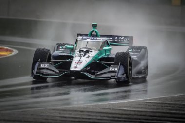 İsveç 'in Kumla kentinden MARCUS ERICSSON (28), Elkhart Gölü, WI' deki Road America 'da düzenlenen XPEL Grand Prix için yapılan ıslak tatbikat sırasında 12. viraja giriyor..