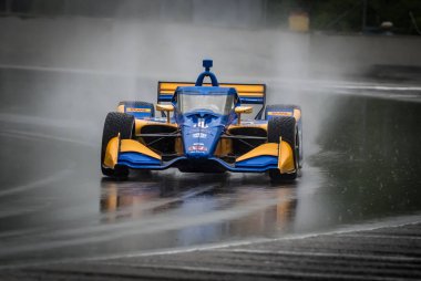 Bridgetown, Barbados 'tan KYFFIN SIMPSON (R) (4), Elkhart Gölü, WI' deki Road America 'da oynanan ıslak antrenman sırasında 12. virajdan (Canada Corner) geçiyor..