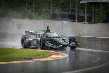 Palo Alto, Kaliforniya 'dan yedek sürücü NOLAN SIEGEL (78), Elkhart Gölü, WI' deki Road America 'da oynanan ıslak antrenman sırasında 12. viraja giriyor (Kanada Köşesi)..