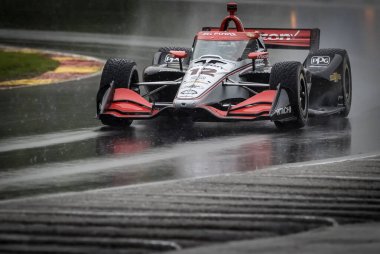 Toowoomba, Avustralya 'dan Will PowER (12), Elkhart Gölü, WI' deki Road America 'da oynanan ıslak antrenman sırasında 12. virajdan (Canada Corner) geliyor..
