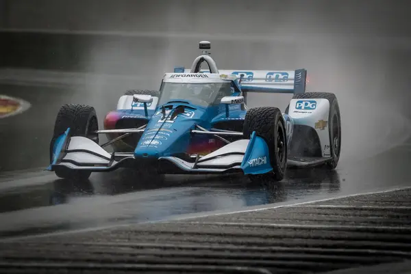 stock image JOSEF NEWGARDEN (2) of Nashville, Tennessee comes through turn 12 (Canada Corner) during a wet practice session for the XPEL Grand Prix at Road America in Elkhart Lake, WI.