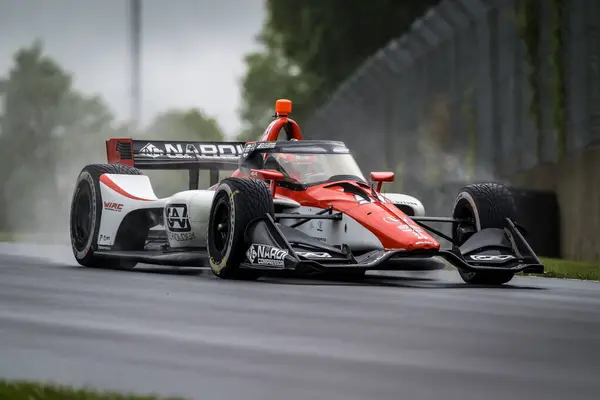 stock image LUCA GHIOTTO (R) (51) of Arzignano, Italy qualifies for the XPEL Grand Prix at Road America in Elkhart Lake, WI.